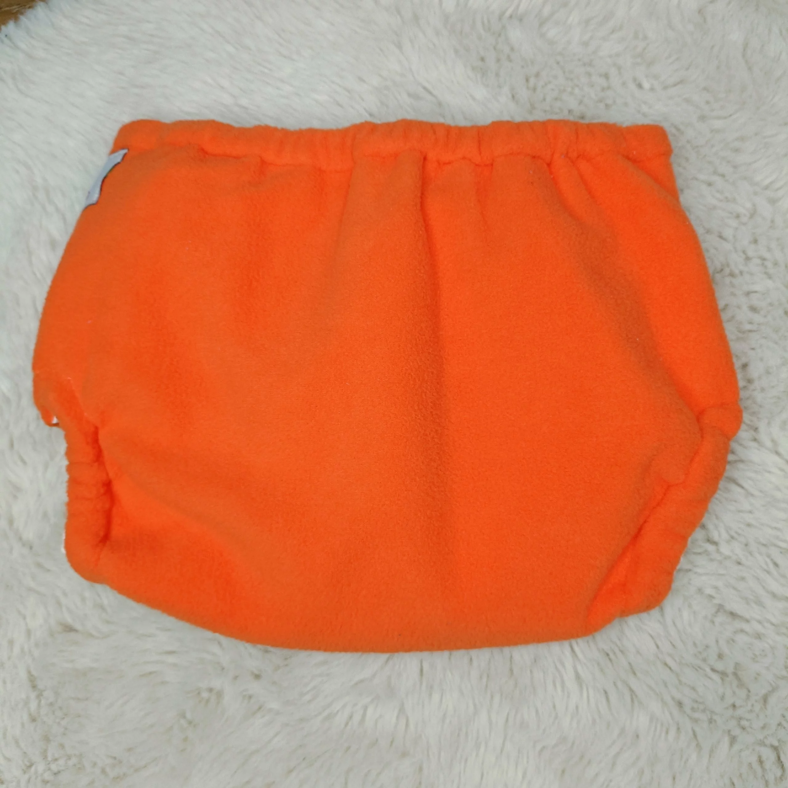 Surcouche ORANGE en micro polaire XS (2 à 6 kg) – BEBELA – Image 2