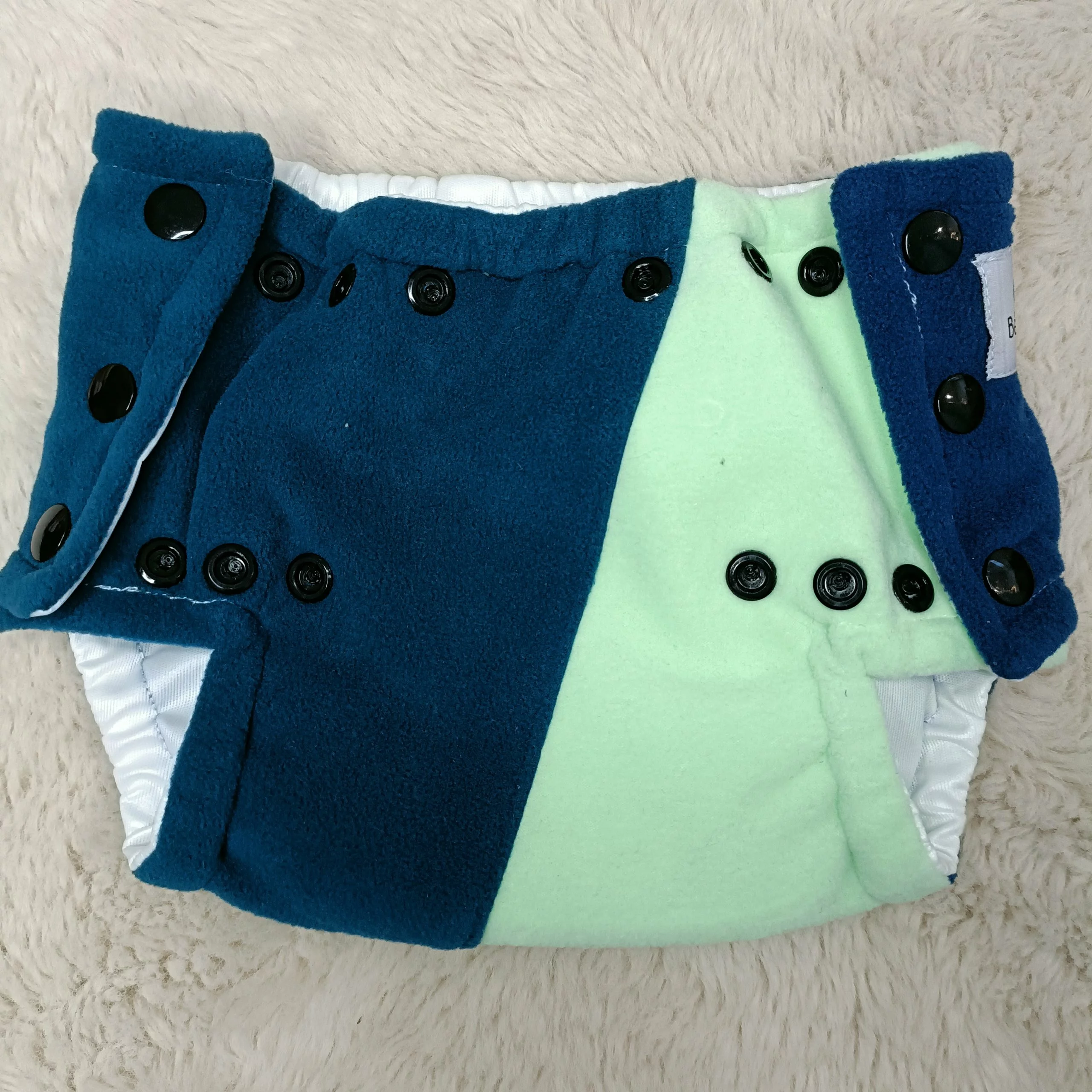 Surcouche TURQUOISE ET MENTHE en micro polaire XS (2 à 6 kg) – BEBELA – Image 3